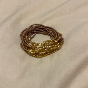 Cute stretchy mauve and gold bracelet